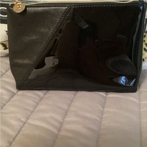 YSL beauty bag.